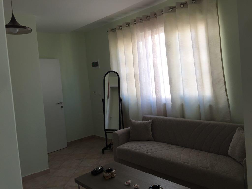 Andi * Tirana